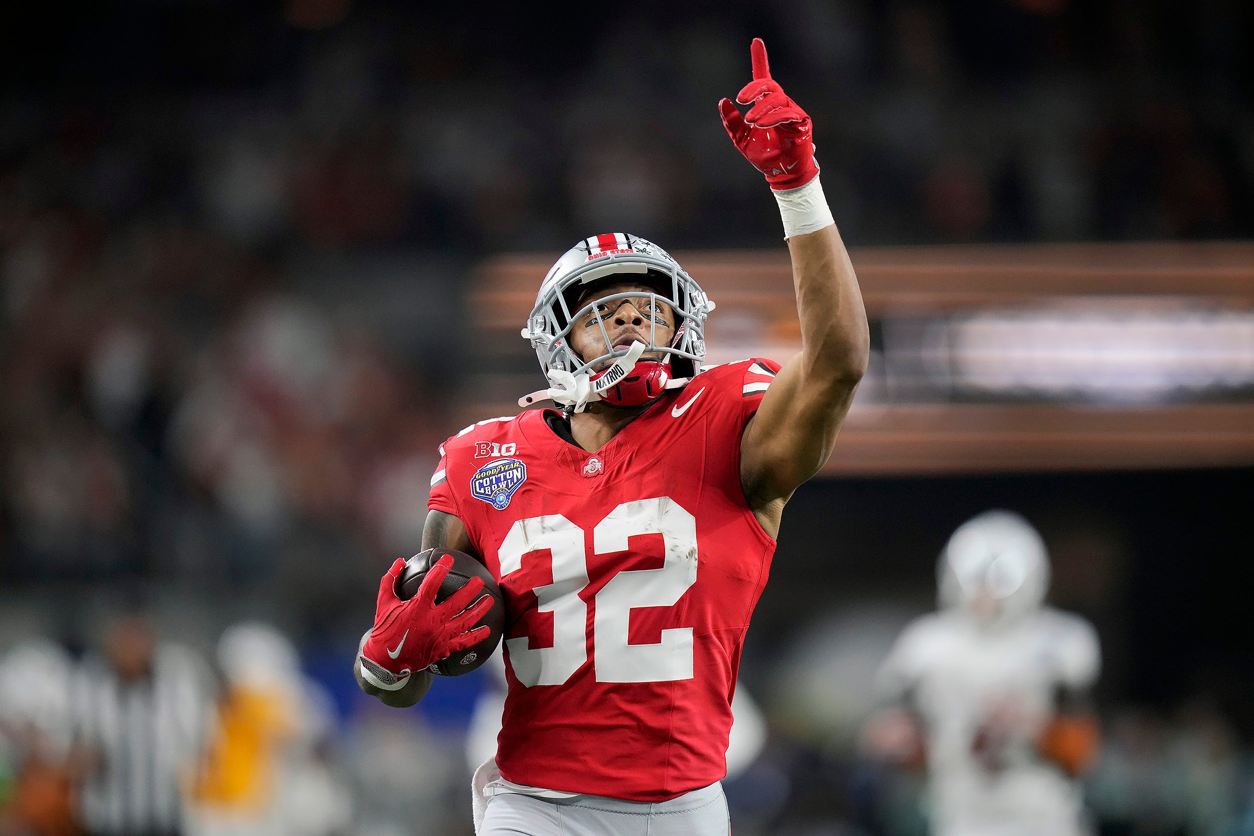 Vikings ignite a fiery clash in NFL's first-round draft with a surprising swoop for Ohio State's TreVeyon Henderson, setting rival teams on a run for backs - Motociclismo