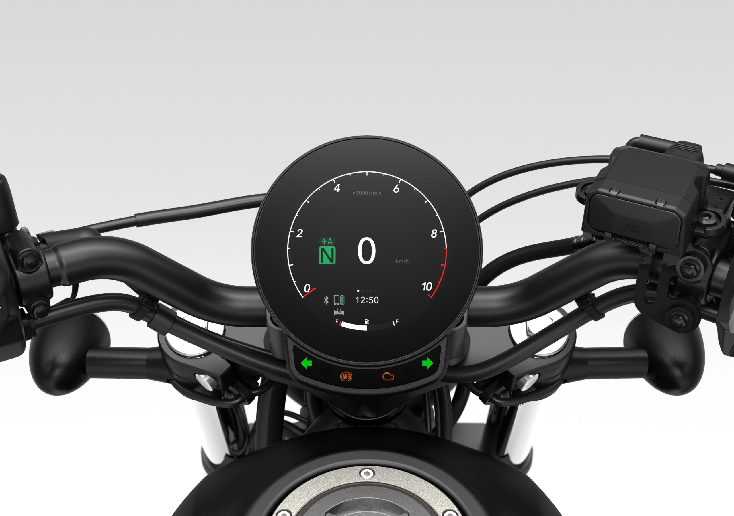 Pormenor do ecrã TFT circular da Honda CMX500 Rebel E-Clutch de 2027, com o conta-rotações no grafismo normal.